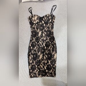 Revamped bodycon lace midi dress in size small